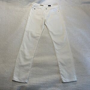 White Jeans. Slight ink stain next to the button.